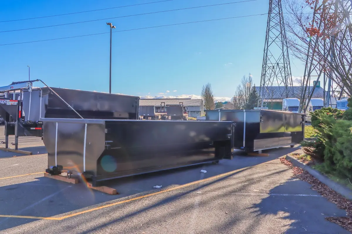 Roll-off dumpster ready for waste disposal at job site for Yard Waste Dumpster Rental in Laurel